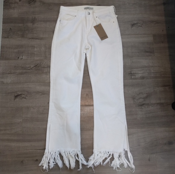 white pants with fringe bottom